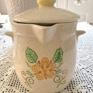 “Vintage jar with lid”